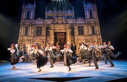 Picture of the company on dancing on stage at Chichester Festival Theatre 